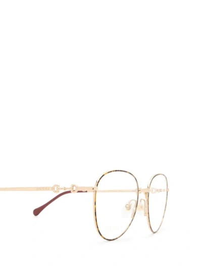 Shop Gucci Eyewear Eyeglasses In Gold / Havana