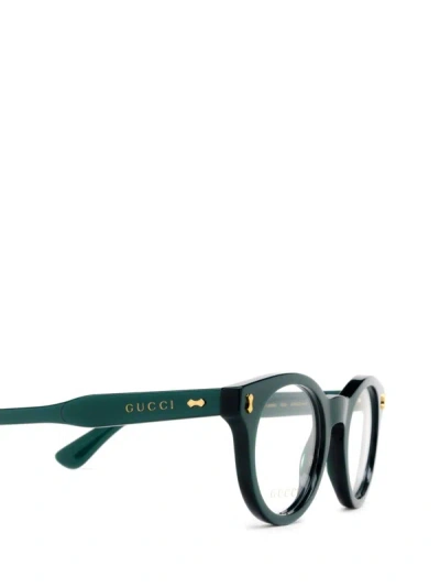 Shop Gucci Eyewear Eyeglasses In Green