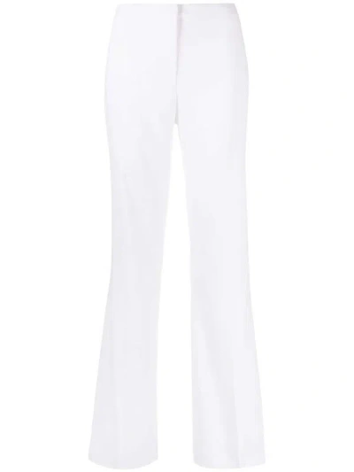 Shop Pinko Trousers White