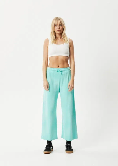 Shop Afends Recycled Wide Leg Trackpants In Colour-blue
