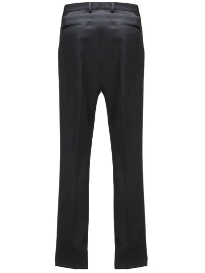 Shop Dolce & Gabbana Trousers In Black