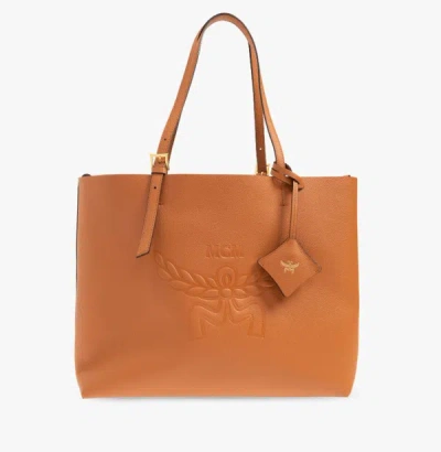 Shop Mcm Medium Himmel Logo-embossed Shoulder Bag In Brown