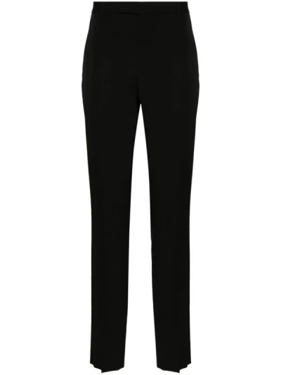 Shop Saint Laurent Slim-fit Trousers In Black