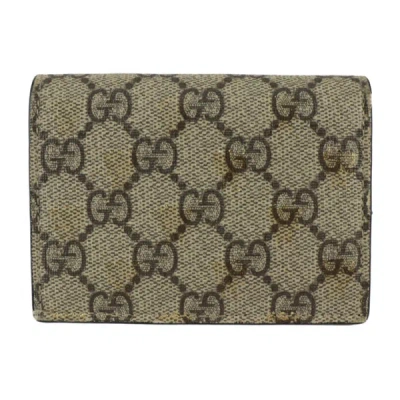 Shop Gucci Beige Canvas Wallet  ()