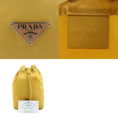 Shop Prada Tessuto Yellow Synthetic Clutch Bag ()