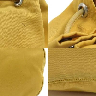 Shop Prada Tessuto Yellow Synthetic Clutch Bag ()