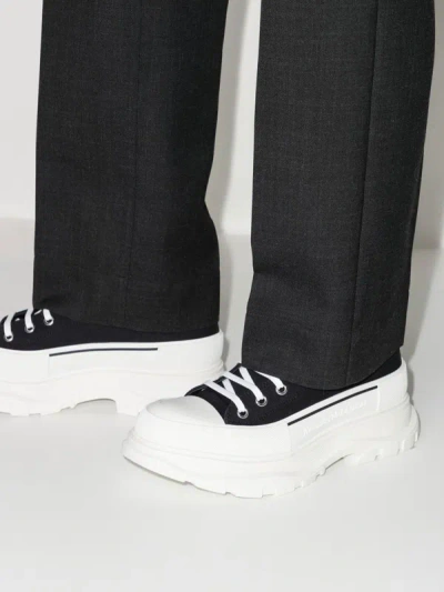 Shop Alexander Mcqueen Tread Slick Sneakers In Nero E Bianco