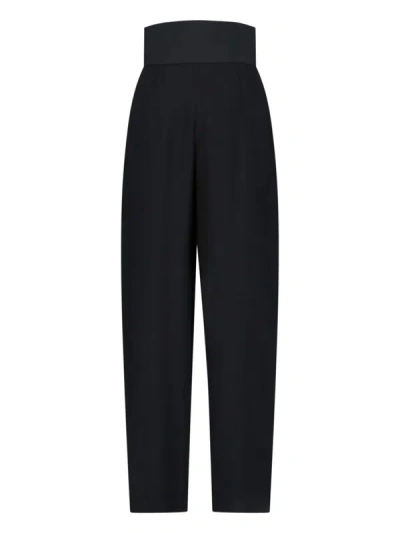 Shop Alaïa High-waisted Belted Trousers In Black