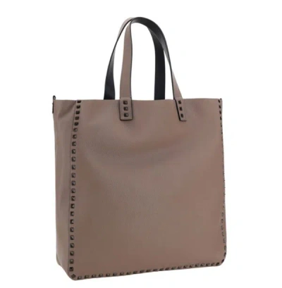 Shop Valentino Garavani "rockstud" Shoulder Bag In Brown