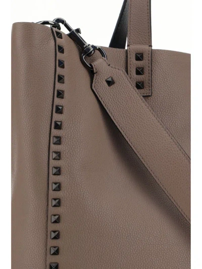 Shop Valentino Garavani "rockstud" Shoulder Bag In Brown