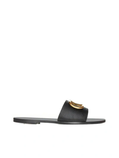 Shop Valentino Garavani - Leather Slides With Logo In Black