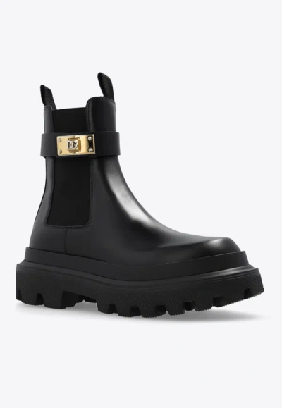 Shop Dolce & Gabbana Branded-strap Leather Ankle Boots In Black