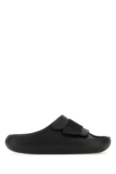 Shop Crocs Slippers In Black