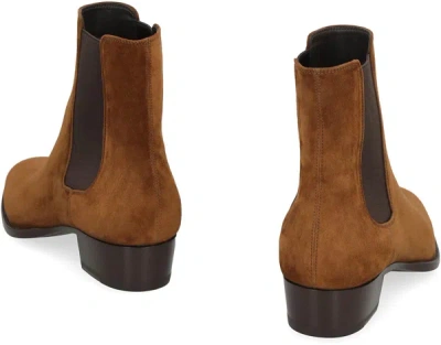 Shop Saint Laurent Wyatt Suede Ankle Boots In Brown