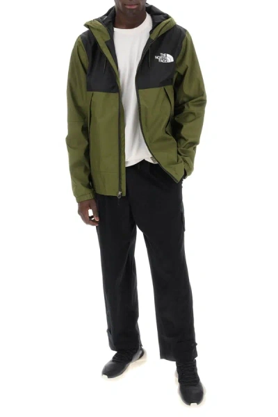 Shop The North Face New Mountain Q Windbreaker Jacket