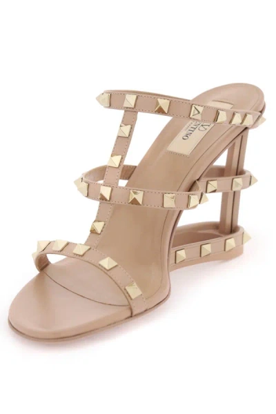 Shop Valentino Garavani Cut Out Wedge Mules With