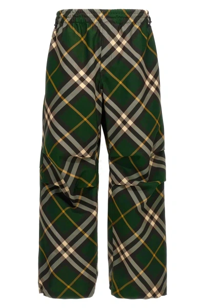 Shop Burberry Men Check Pants In Green