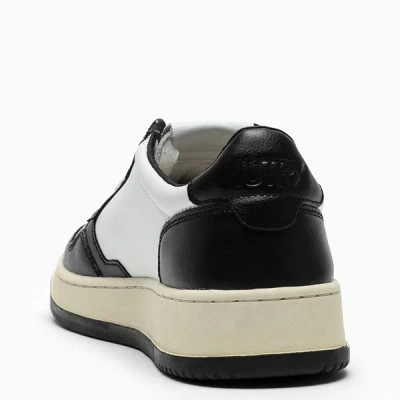 Shop Autry Medalist Sneakers In White/black Leather