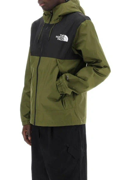 Shop The North Face New Mountain Q Windbreaker Jacket