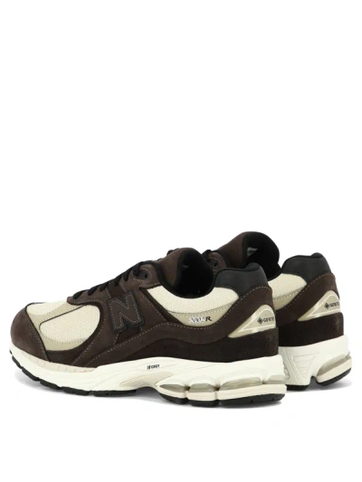 Shop New Balance "2002" Sneakers