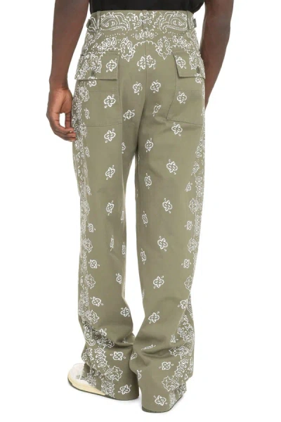 Shop Amiri Printed Cotton Trousers In Green