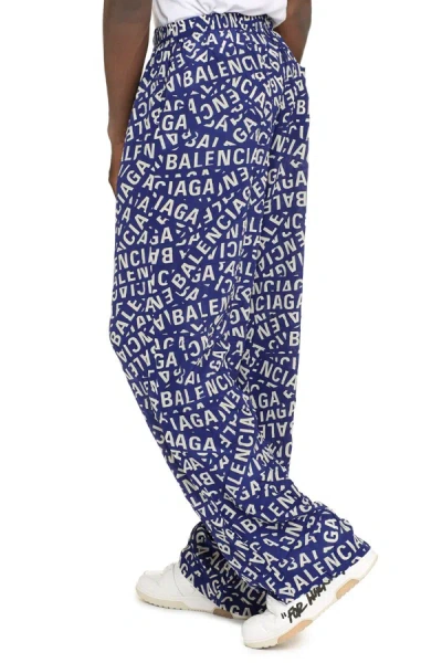 Shop Balenciaga Printed Silk Pants In Blue