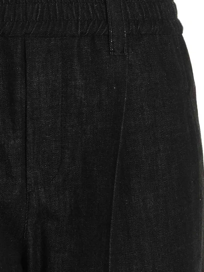 Shop Brunello Cucinelli Elasticized Waist Jeans In Black