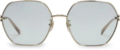 Shop Gucci Oversized Sunglasses In Gold