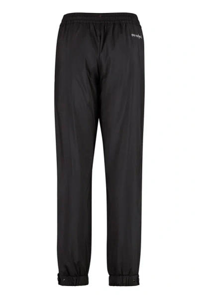 Shop Moncler Grenoble Techno Fabric Track Pants In Black
