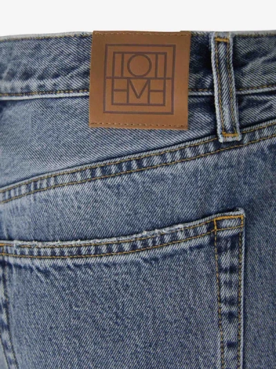 Shop Totême Straight Cotton Jeans In Denim Blue
