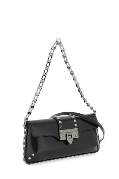 Shop Valentino Garavani Rockstud Shoulder Bag In Black