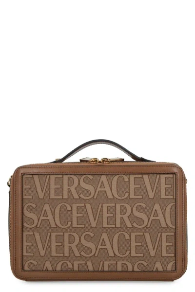 Shop Versace Canvas Messenger Bag In Beige
