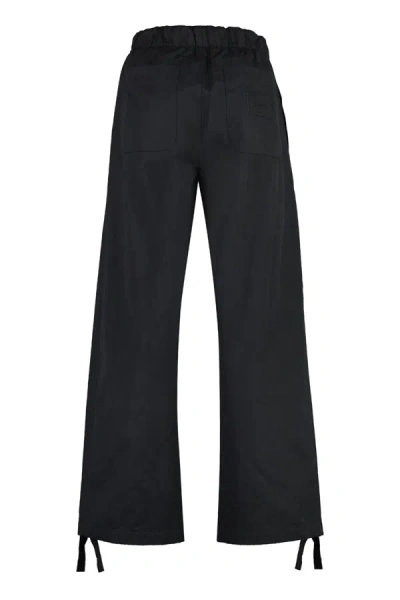 Shop Versace Cotton Trousers In Black