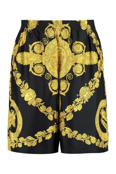 Shop Versace Printed Silk Shorts In Black