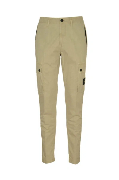 Shop Stone Island Trousers In Sand
