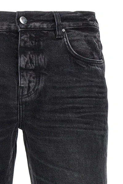 Shop Amiri Men 'release Hem' Jeans In Black