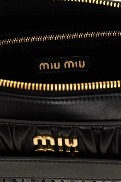 Shop Miu Miu Women Matelassé Leather Clutch Bag In Black