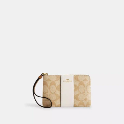 Shop Coach Outlet Corner Zip Wristlet In Signature Canvas With Stripe In Beige