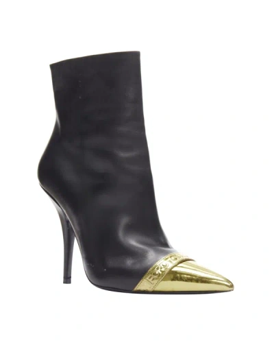 Shop Tom Ford Black Leather Gold Toe Cap Logo Stiletto Heel Ankle Boots