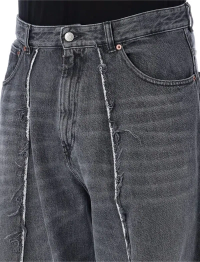 Shop Mm6 Maison Margiela Distressed Jeans In Black