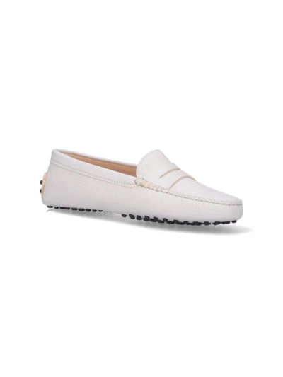 Shop Tod's Flat Shoes In White