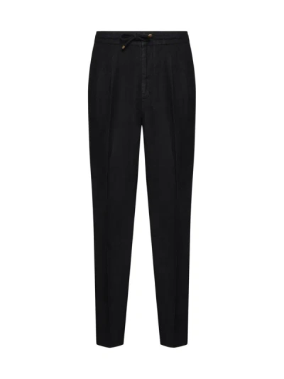 Shop Brunello Cucinelli Trousers In Black