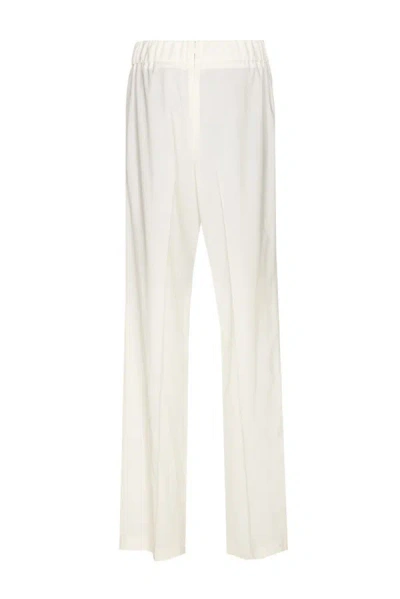 Shop Dolce & Gabbana Trousers In Bianco