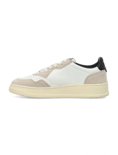 Shop Autry Medalist Low Woman Sneakers In White Black