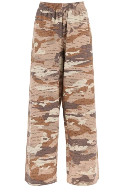 Shop Acne Studios Camouflage Jersey Pants For Men Women In Cream