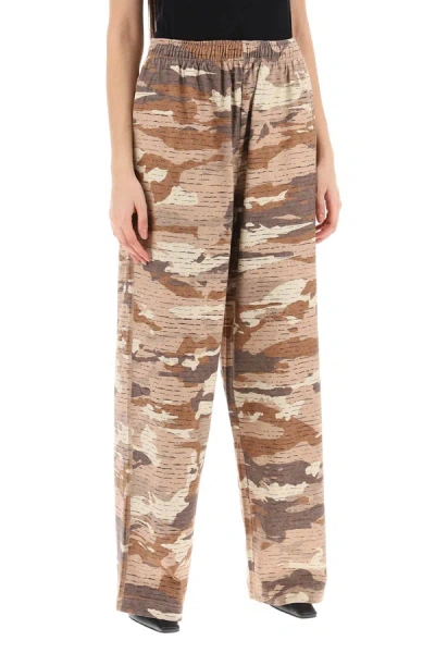 Shop Acne Studios Camouflage Jersey Pants For Men Women In Cream