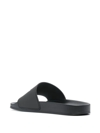 Shop Palm Angels Embossed Slippers In Black