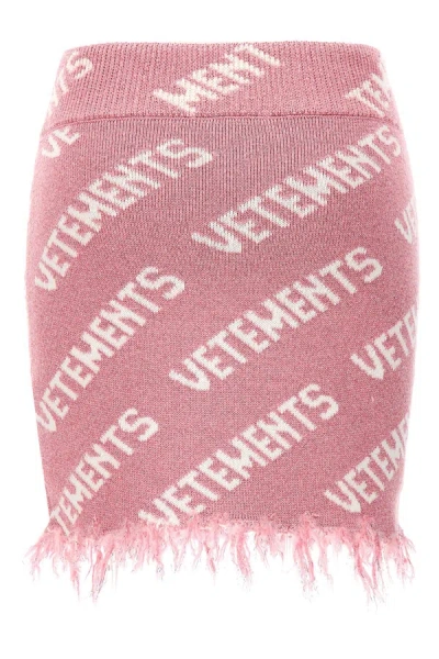 Shop Vetements Women 'iconic Lurex Monogram' Skirt In Pink