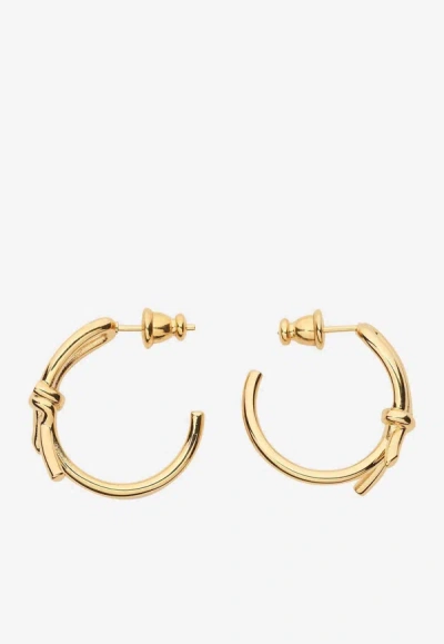 Shop Ferragamo Bow Hoop Earrings In Gold
