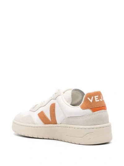 Shop Veja 'v-90' Sneakers In White